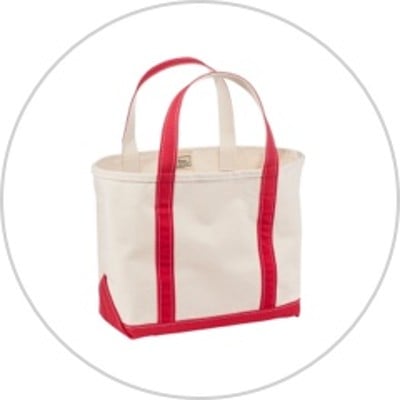 An L. L. Bean Boat and Tote with red trim.