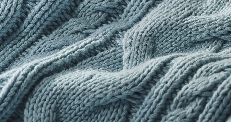 Detail image of sweater fabric.