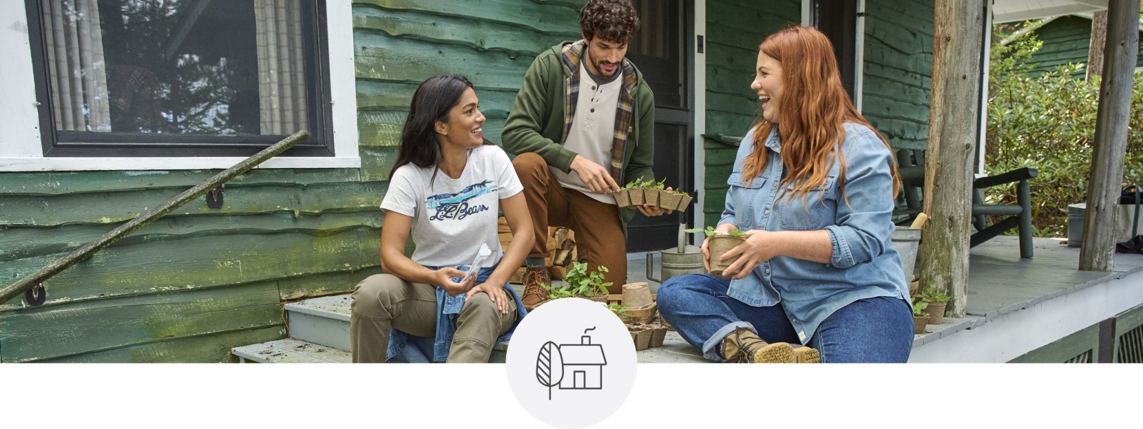 3 friends sitting outside on a rustic porch.