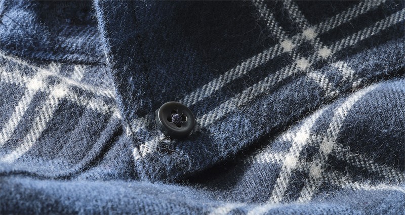 Detail image of flannel shirt.