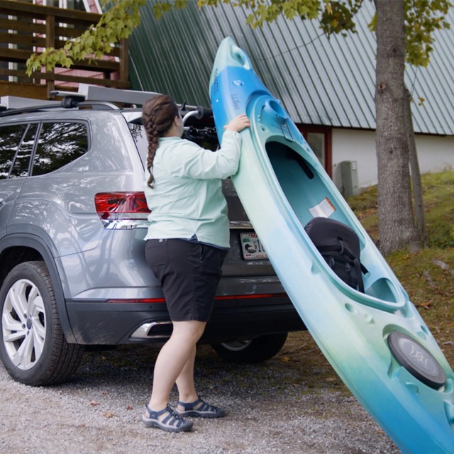 Getting out of your kayak onto a dock.