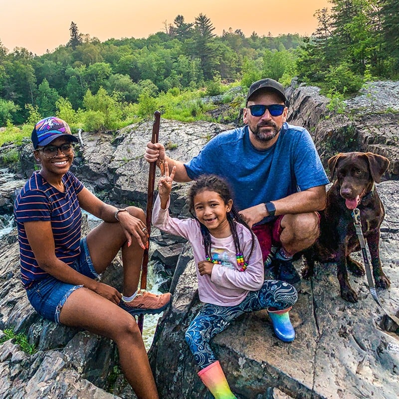 The Dowd family and their dog, taking a break on the rocks.