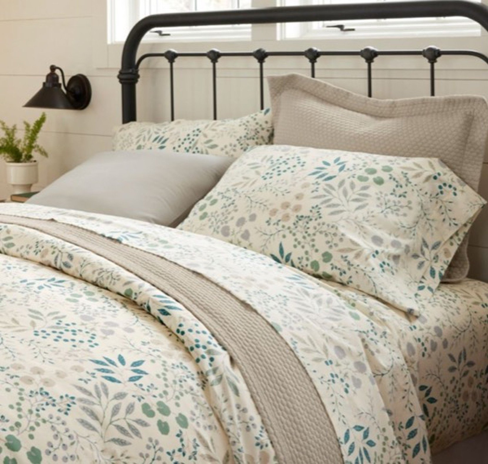 Bed made with floral Percale Sheet