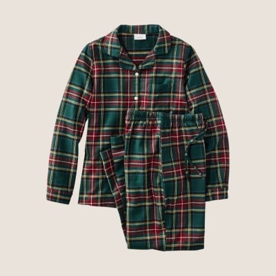 Two-piece green plaid flannel pajama set with button-up top and elastic waist pants.